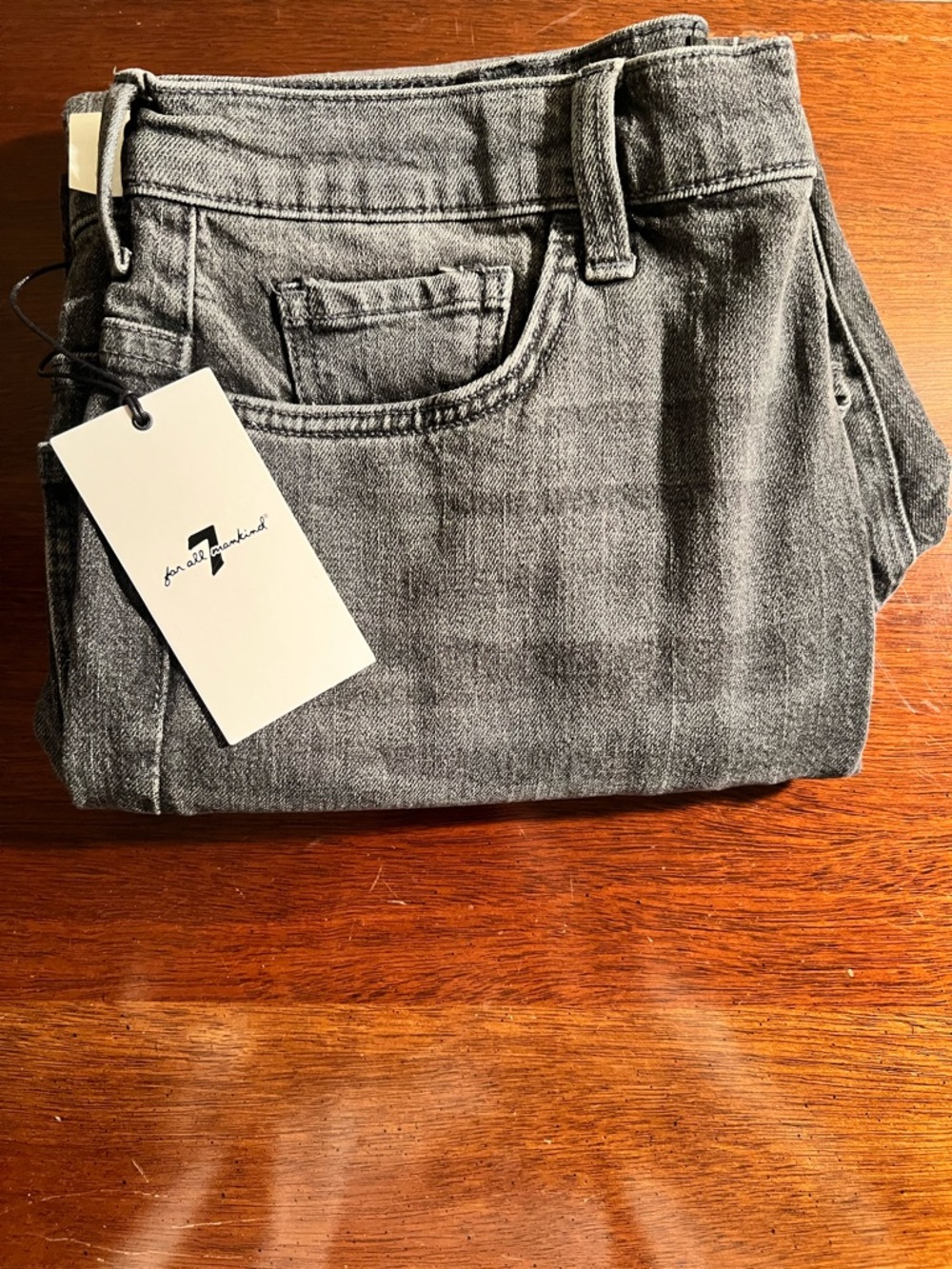 7 For All Mankind Women's Easy Boot Cut Jean in Stoned Wash Black. Size 31